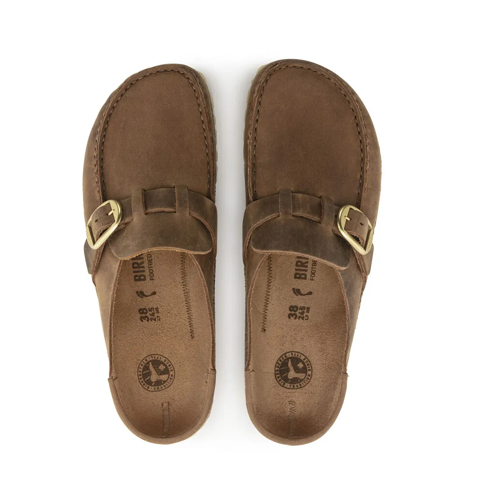 Here is an optimized product title with modifiers:

Birkenstock Womens Buckley Oiled Leather Slip-On Clogs - Premium Comfort Footwear